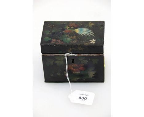 An early 19th century Pontypool tea caddy, of rectangular form, the hinged lid, front and sides decorated with an exotic bird