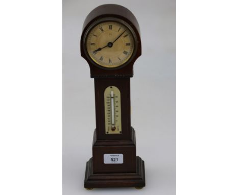 An early 20th century Junghans mahogany and strung mantel timepiece, fashioned as a longcase, with eight-day movement faced b