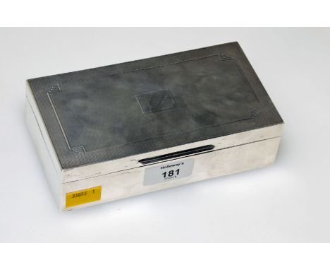A 1930s heavy silver cigarette box, with engine turned decoration, London 1932, by Mappin and Webb, 13 troy oz gross weight,1
