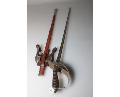 A George V Household Cavalry sword, the etched 89.5cm fullered blade with scroll decorated full guard, wire bound hide handle