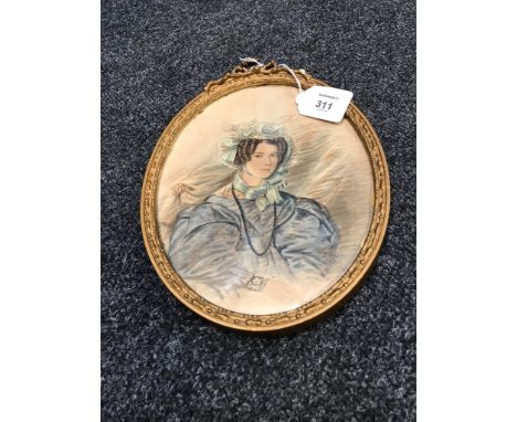 E. H. (early 19th century British School) Half length portrait of a seated young lady wearing a lace trimmed bonnet and pale 