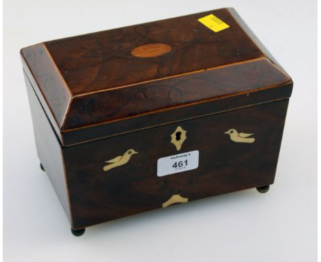 A George III mahogany boxwood bone inlaid and florally strung tea caddy, of chamfered rectangular form, the top inlaid with o