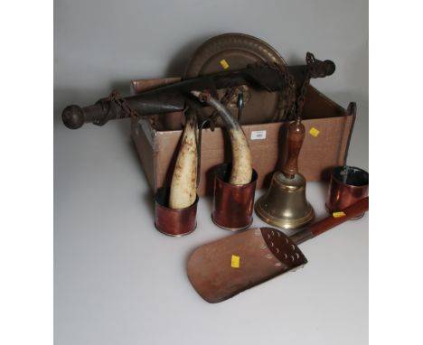 A collection of vintage rural wares, including a wooden yoke, brass hand bell, horse martingales, horn scoops and other items