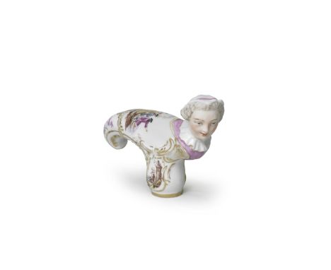 A Meissen figural cane handle, 19th centuryModelled with a woman's head wearing a white bonnet and white ruff over a pink blo