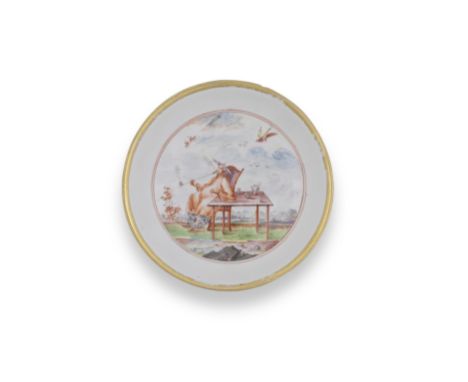 An early Meissen saucer, circa 1723Painted with a chinoiserie scene of a man seated at a table  smoking a pipe in a landscape
