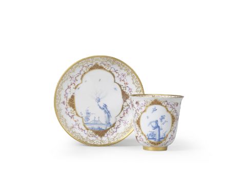 A very rare Meissen beaker and saucer, circa 1728Painted with blue monochrome chinoiserie scenes, each depicting a single fig