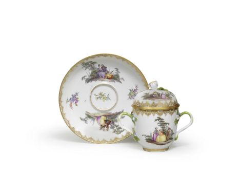 A Meissen large chocolate cup, cover and stand, circa 1760Painted with Watteauesque vignettes of elegant figures in landscape