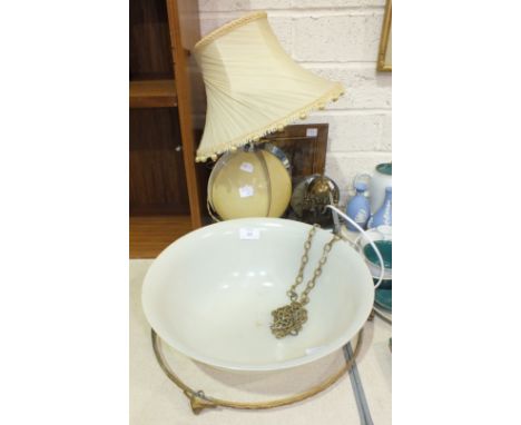 An opaque glass hanging light bowl with gilt metal support, decorated with rams' heads, 34cm diameter, 13cm high, a modern br