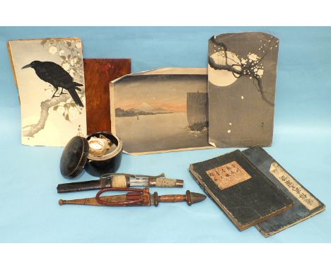 A Chinese ceramic pot and cover containing artist's materials, two Oriental manuscript books and other items.