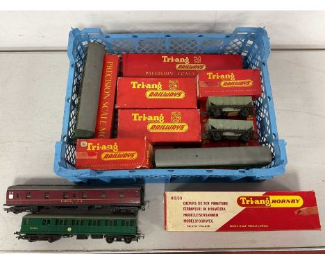 A quantity of Triang OO gauge locomotives and rolling stock, mostly in original boxes, including Southern Electric motor car,
