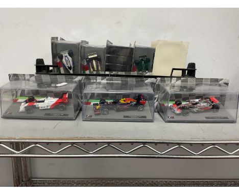 Fourteen 1:43rd Scale 'Panini F1 Collection' Diecast Model Formula One Racing Cars to include McLaren MP4/4 1988 - Ayrton Sen