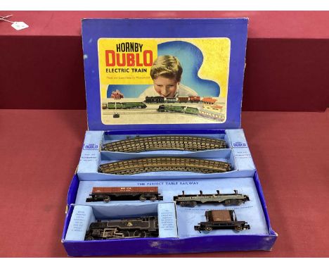 A boxed Hornby Dublo OO gauge 3-rail train set including 2-6-4 tank engine, two bogie freight wagons, guards van and track, u
