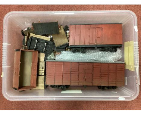 Three G scale scratch-built American outline freight wagons, together with component parts including wheels and underframes f