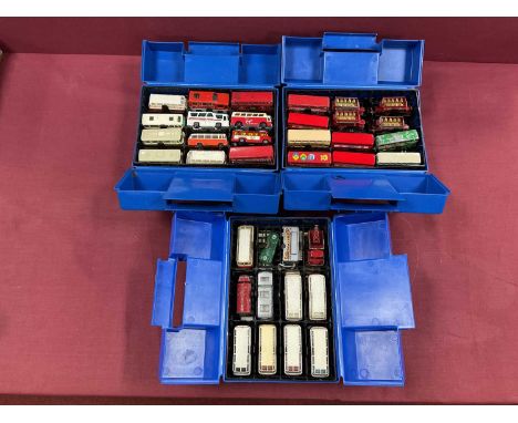Approximately Sixty Five Diecast Model Vehicles by Matchbox, Corgi, mostly buses. Presented within Three Matchbox Hard Plasti