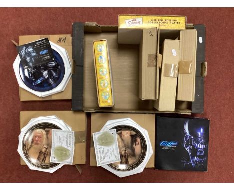 Nine Limited Edition Collector Plates. Themes include The Simpsons, Star Wars, Alien vs. Predator, Lord of the Rings, all box