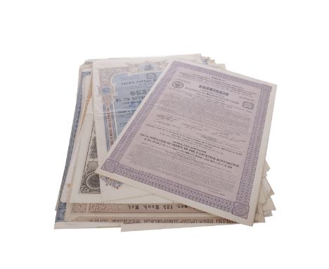 COLLECTION OF SHARE AND BOND CERTIFICATES comprising mainly Russian examples and several from the USA, all dating to the earl