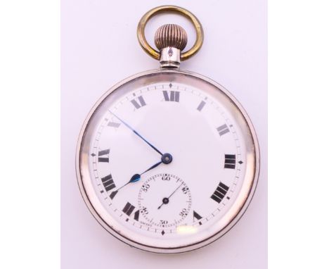 A silver open faced pocket watch. 4.75 cm diameter. 