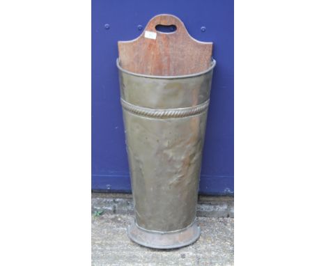 A late 19th/early 20th century brass and wooden stick stand. 80 cm high.