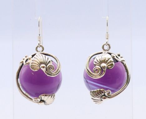 A pair of silver amethyst earrings.  2.5 cm high. 