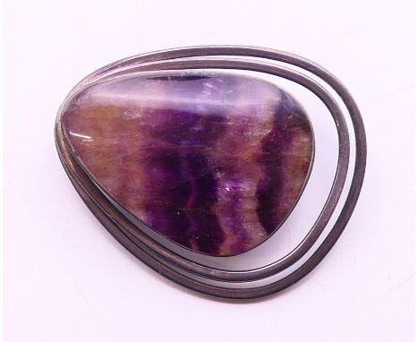 A silver and Blue John pendant/brooch.  4 cm high. 