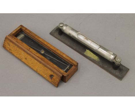 A boxed W Ottway and Co military trough compass engraved 'II 1049 1910' in wooden box and a boxed J Rabone and Sons engineer'