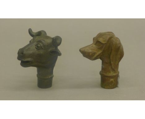 Two bronze walking stick handles. The largest 7 cm high.