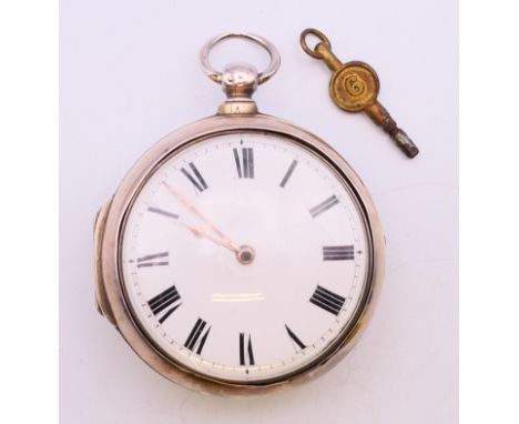 A 19th century silver pair cased pocket watch. 5.5 cm diameter.
