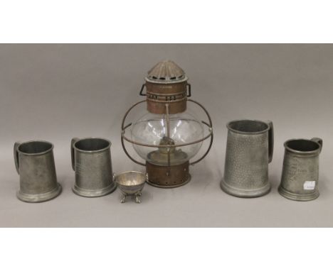 A silver-plated salt, three pewter mugs and a copper and glass lantern. The latter 24 cm high.