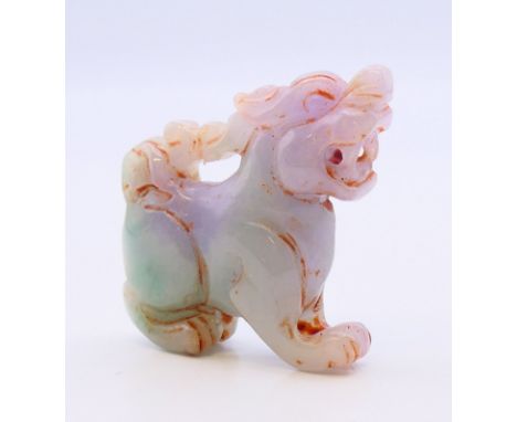 A small jade dog-of-fo.  3.75 cm high. 