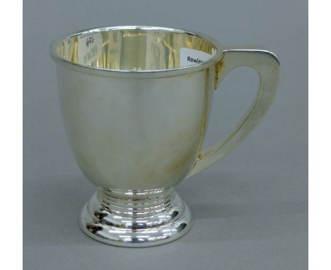 A silver christening mug. 8.5 cm high. 97 grammes.