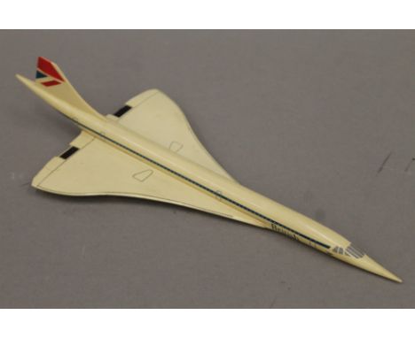 A 1960's model of British Airways Concorde. 24.5 cm long.