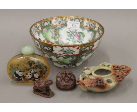 Two netsukes, a Canton porcelain bowl, a large glass snuff bottle and a soapstone teapot. The bowl 20 cm wide.