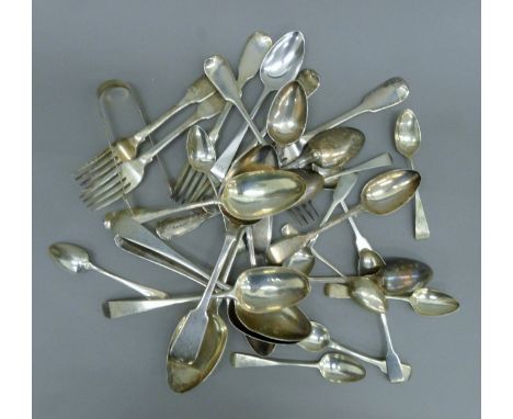 A quantity of silver cutlery. 1275.1 grammes. 