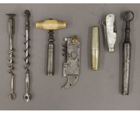 Seven corkscrews: The PAL USA multi-tool, small roundlet, small pocket knife multi-tool, picnic with bone T handle and steel 