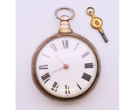 A 19th century silver pair cased pocket watch. 5 cm diameter.