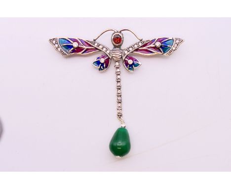 A silver dragonfly brooch.  6.5 cm high x 7 cm. 