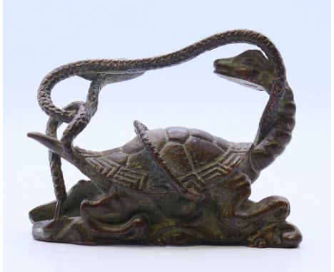 A bronze model of a turtle and a snake. 6.5 cm wide.
