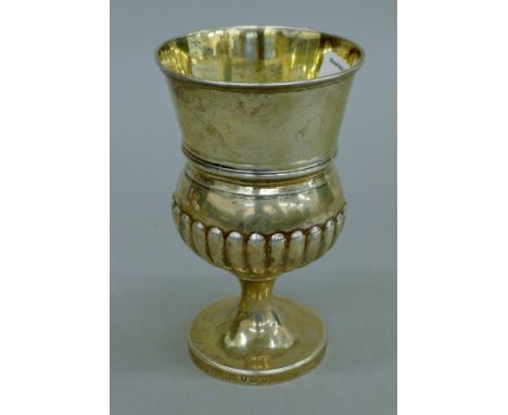 A stop gadrooned silver goblet, hallmarked for 1807. 15.5 cm high. 228.3 grammes. 