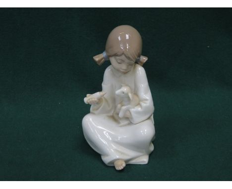 NAO GLAZED CERAMIC SEATED FIGURINE, APPROXIMATELY 18cm HIGH 