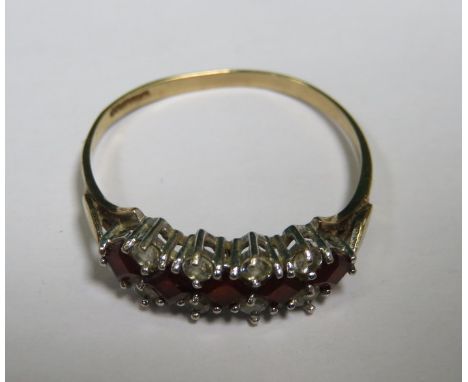 9ct GOLD DRESS RING WITH RUBY COLOURED AND CLEAR STONES 