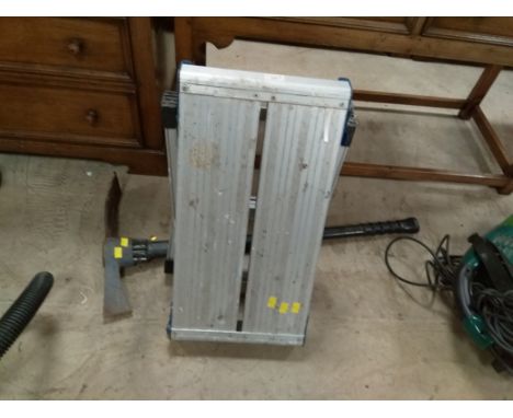 A pick axe and a folding platform 