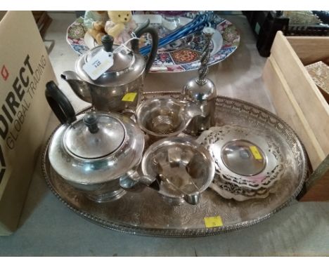 A silver plated tray, with teapot, coffee pot, sugar bowl, milk jug, and other items 