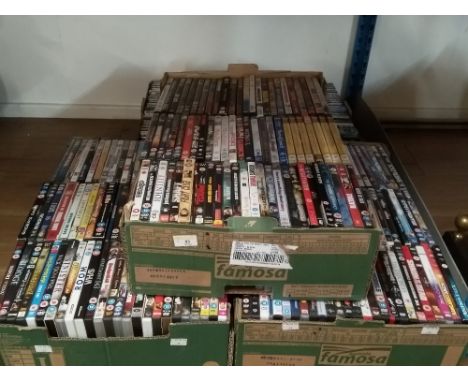 Four boxes of DVD's, to include Fight Club, Lord of the Rings, Role Models, and The Expendables