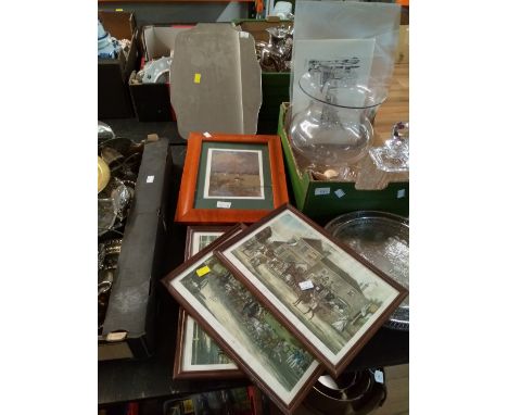 A frame less shaped mirror with hunting scene print