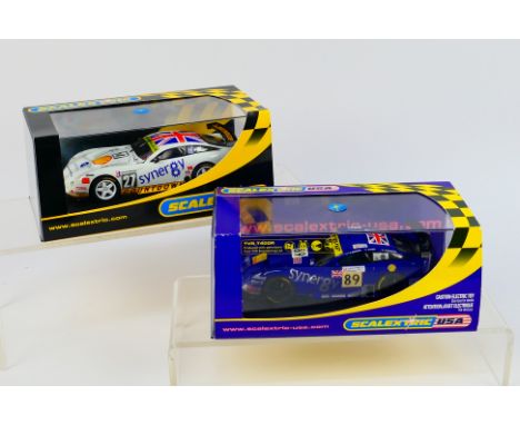 Scalextric - Two boxed TVR Tuscan Scalextric slot cars. Lot consists of C2657 TVR Tuscan 400R 'Synergy' RN89; with C2590 TVR 