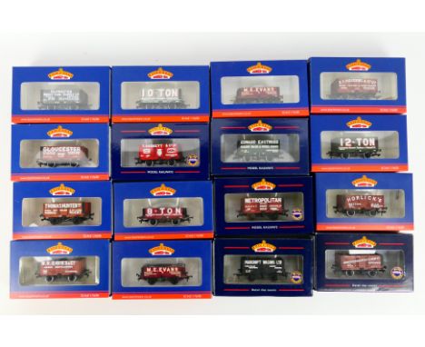 Bachmann - 20 x boxed OO gauge wagons, 9 x are 7 plank wagons, 3 x 5 plank and 8 x 8 plank in various liveries including a pa