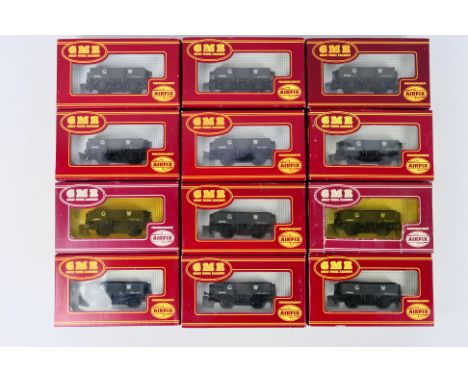 Great Model Railways / Airfix - A rake of 12 OO gauge boxed GMR / Airfix #54372-9 5-Plank wagons in GWR grey livery '109458'.