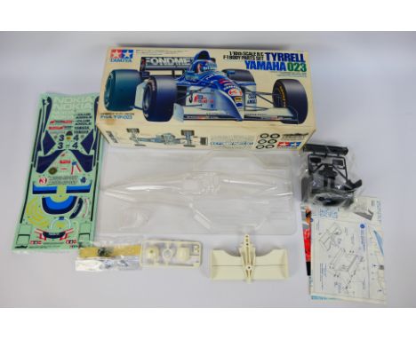 Tamiya - A boxed vintage Tamiya 1:10 scale #50656 Tyrell Yamaha 023 RC F1 Body Parts Set. The set comes with body shell, part