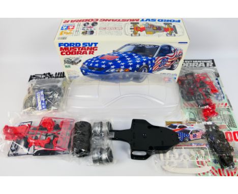 Tamiya - A boxed vintage 1996 Tamiya #58169 1:10 scale electric Ford SVT Mustang Cobra R High Performance Racing Car kit. The