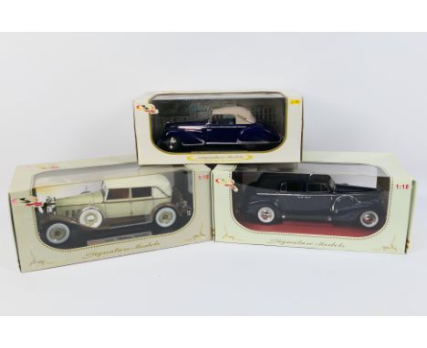 Signature Models - Three boxed diecast 1:18 scale American model cars from Signature Models. Lot comprises of #18122 1947 Del